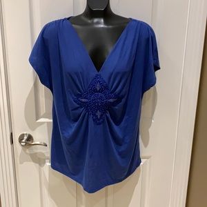 Women’s blue top